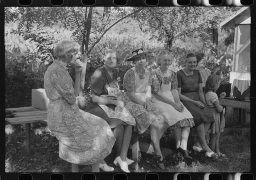 Untitled photo, possibly related to: Parishoners of St. Thomas Church resting after spending many hous preparing food for a benefit picnic supper. Near Bardstown, Kentucky