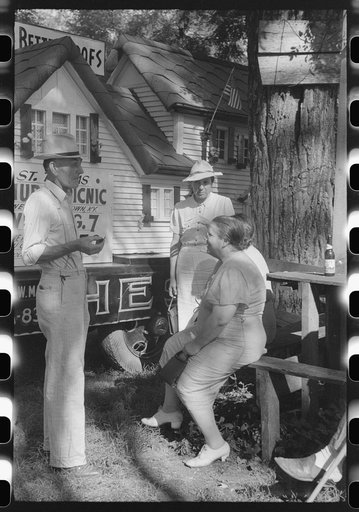 Untitled photo, possibly related to: Parishioners waiting to go into a picnic supper for the benefit of the church. Near Bardstown, Kentucky