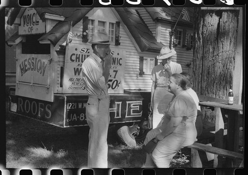 Parishioners waiting to go into a picnic supper for the benefit of the church. Near Bardstown, Kentucky