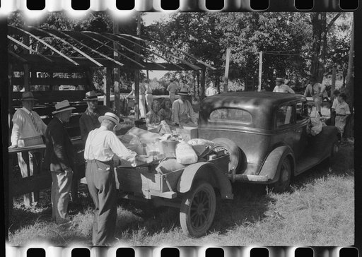 Untitled photo, possibly related to: Unpacking supplies at the St. Thomas Church picnic supper near Bardstown, Kentucky