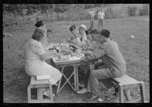 Legionnaires and their wives eating and drinking beer at American Legion fish fry, Oldham County, Post 39, near Louisville, Kentucky