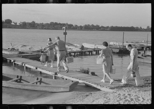 People from Louisville, Kentucky, taking a picnic supper on their boat on the Ohio River