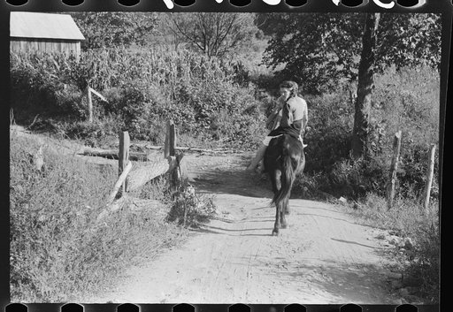 Untitled photo, possibly related to: Relatives and friends of the family of the deceased going home from a memorial meeting in the mountains near Jackson, Kentucky. See general caption no. 1