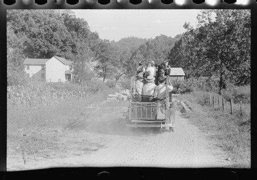Relatives and friends of the family of the deceased going home from a memorial meeting in the mountains near Jackson, Kentucky. See General caption no. 1