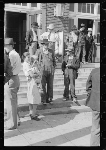 Carrying home groceries and supplies across the swinging bridge, Breathitt County, Jackson, Kentucky