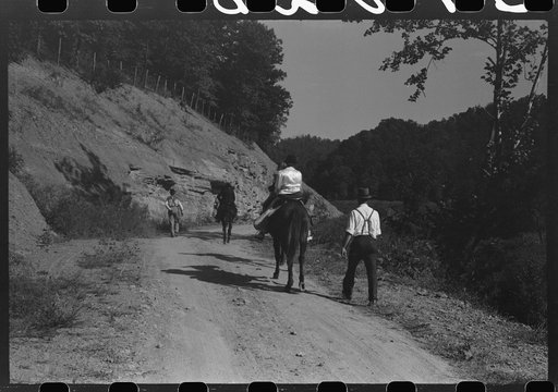 Untitled photo, possibly related to: Relatives and friends of the family of the deceased going home from a memorial meeting in the mountains near Jackson, Kentucky. See general caption no. 1