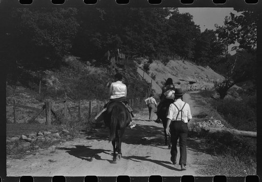 Untitled photo, possibly related to: Relatives and friends of the family of the deceased going home from a memorial meeting in the mountains near Jackson, Kentucky. See general caption no. 1
