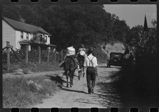 Untitled photo, possibly related to: Relatives and friends of the family of the deceased going home from a memorial meeting in the mountains near Jackson, Kentucky. See general caption no. 1