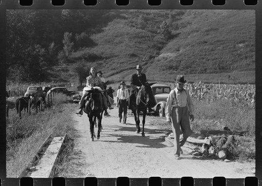 Untitled photo, possibly related to: Relatives and friends of the family of the deceased going home from a memorial meeting in the mountains near Jackson, Kentucky. See general caption no. 1
