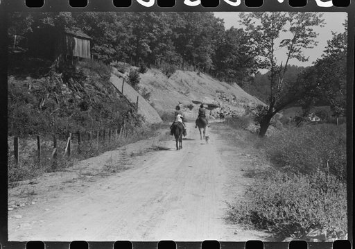 Untitled photo, possibly related to: Relatives and friends of the family of the deceased going home from a memorial meeting in the mountains near Jackson, Kentucky. See general caption no. 1