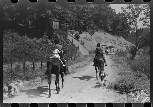 Untitled photo, possibly related to: Relatives and friends of the family of the deceased going home from a memorial meeting in the mountains near Jackson, Kentucky. See general caption no. 1