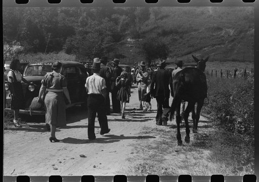 Untitled photo, possibly related to: Relatives and friends of the family of the deceased going home from a memorial meeting in the mountains near Jackson, Kentucky. See general caption no. 1