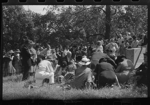 Friends of the deceased's family, at an annual memorial meeting in the family cemetery. In the mountains near Jackson, Kentucky. See general caption no. 1