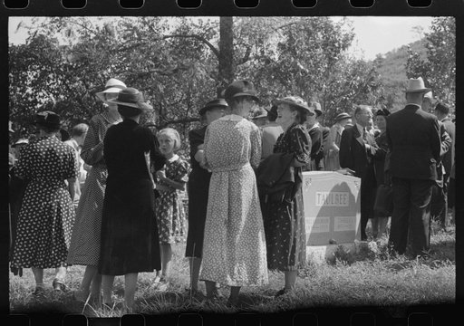 Friends and relatives of the deceased chatting after the memorial meeting is over. Up Frozen Creek, near Jackson, Breathitt County, Kentucky. See general caption no. 1