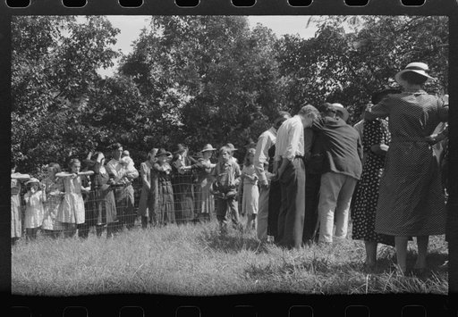 Untitled photo, possibly related to: Friends and relatives of the deceased chatting after the memorial meeting is over. Up Frozen Creek, near Jackson, Breathitt County, Kentucky. See general caption no. 1