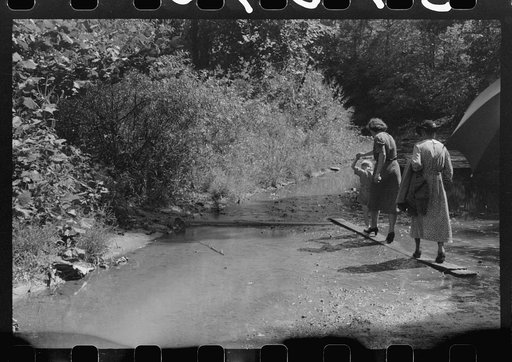 Untitled photo, possibly related to: Mountain people leaving the Primitive Baptist Church in Morehead, Kentucky, and going down to the creek for a baptizing