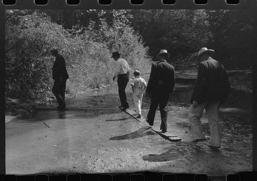 Untitled photo, possibly related to: Mountain people leaving the Primitive Baptist Church in Morehead, Kentucky, and going down to the creek for a baptizing