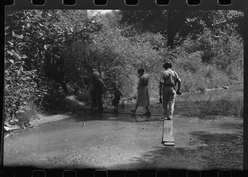 Untitled photo, possibly related to: Mountain people leaving the Primitive Baptist Church in Morehead, Kentucky, and going down to the creek for a baptizing