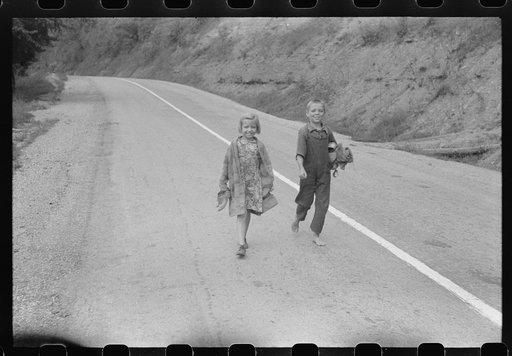 Mountain children going home along highway near Jackson, Breathitt County, Kentucky