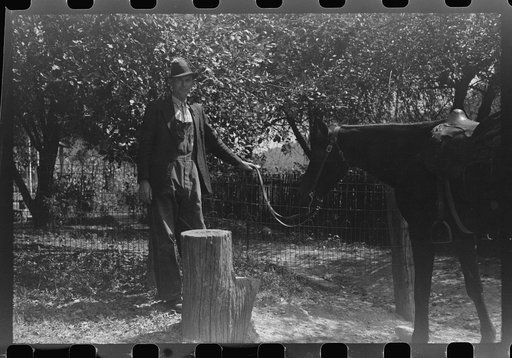 Untitled photo, possibly related to: Woman using mounting block up Burton's Fork, Kentucky River, near Jackson, Kentucky