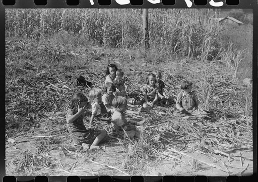 Untitled photo, possibly related to: Homebuilt boiler pit made of mud and rocks where the sap from the sorghum cane is boiled down to the syrup.The man who does the cooking goes from one farmhouse to another and takes a share of the syrup for his work at the different mountaineers' homes in Breathit