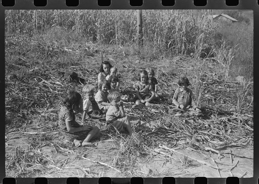 Untitled photo, possibly related to: Homebuilt boiler pit made of mud and rocks where the sap from the sorghum cane is boiled down to the syrup.The man who does the cooking goes from one farmhouse to another and takes a share of the syrup for his work at the different mountaineers' homes in Breathit