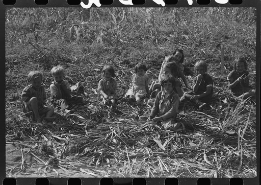 Untitled photo, possibly related to: Homebuilt boiler pit made of mud and rocks where the sap from the sorghum cane is boiled down to the syrup.The man who does the cooking goes from one farmhouse to another and takes a share of the syrup for his work at the different mountaineers' homes in Breathit