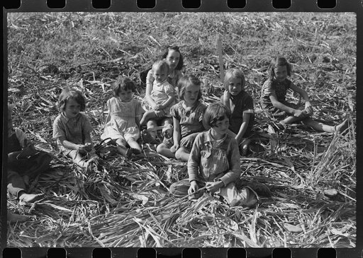 Untitled photo, possibly related to: Homebuilt boiler pit made of mud and rocks where the sap from the sorghum cane is boiled down to the syrup.The man who does the cooking goes from one farmhouse to another and takes a share of the syrup for his work at the different mountaineers' homes in Breathit