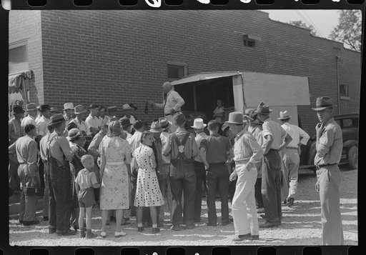 Untitled photo, possibly related to: Itinerant salesman haranguing crowd of farmers on court day, Campton, Kentucky