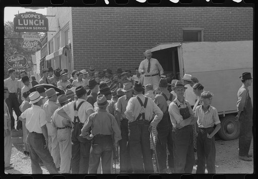 Itinerant salesman haranguing crowd of farmers on court day, Campton, Kentucky