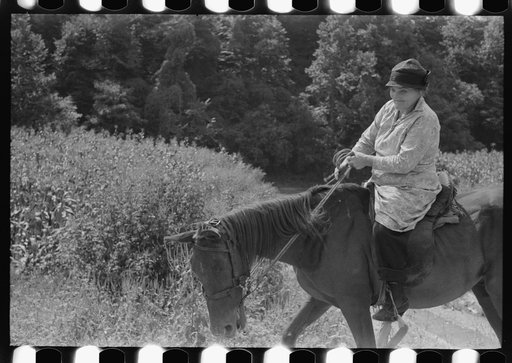 Untitled photo, possibly related to: Mountain woman riding to town up Frozen Creek, near Jackson, Breathitt County, Kentucky