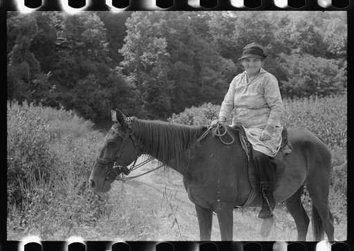 Untitled photo, possibly related to: Mountain woman riding to town up Frozen Creek, near Jackson, Breathitt County, Kentucky