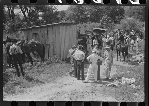 Untitled photo, possibly related to: Farmers trading mules and horses on "Jockey Street" in Campton, Kentucky