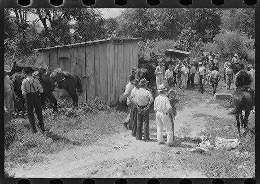 Untitled photo, possibly related to: Farmers trading mules and horses on "Jockey Street" in Campton, Kentucky