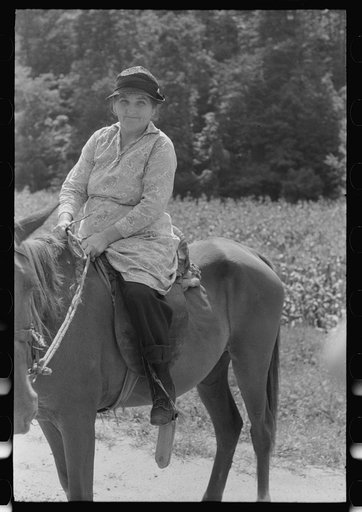 Untitled photo, possibly related to: Mountain woman riding to town up Frozen Creek, near Jackson, Breathitt County, Kentucky