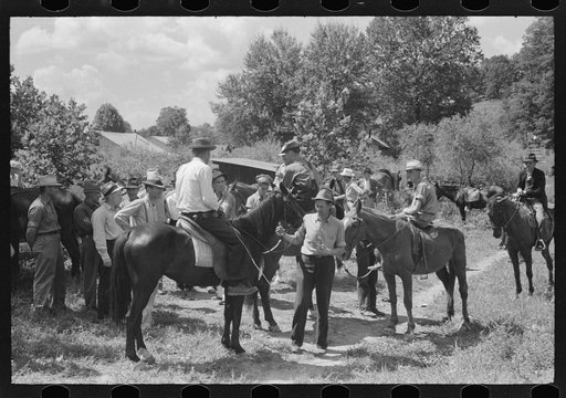 Untitled photo, possibly related to: Farmers trading mules and horses on "Jockey Street" in Campton, Kentucky