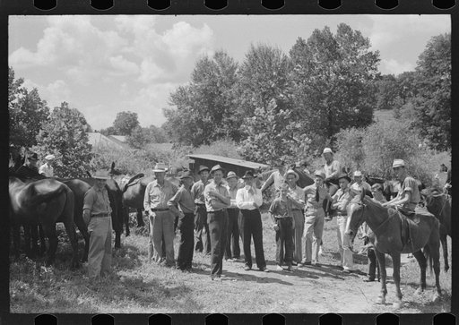 Untitled photo, possibly related to: Farmers trading mules and horses on "Jockey Street" in Campton, Kentucky