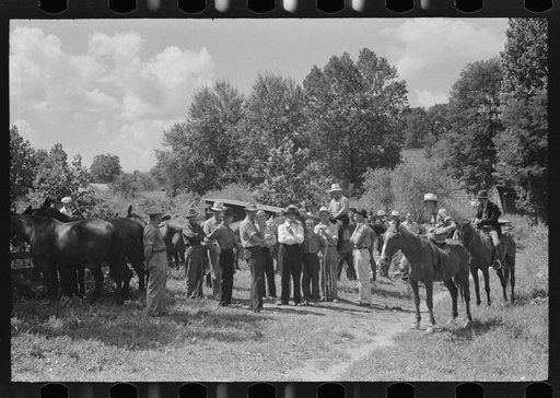Untitled photo, possibly related to: Farmers trading mules and horses on "Jockey Street" in Campton, Kentucky