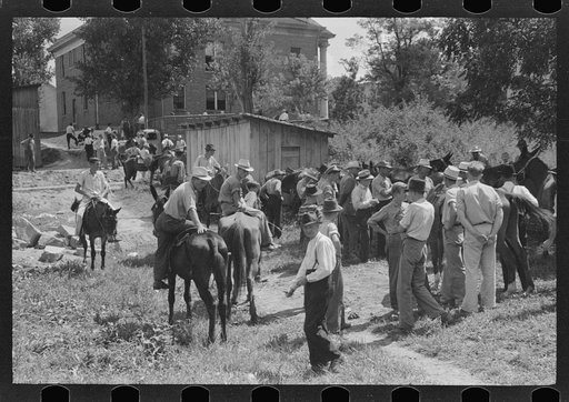Untitled photo, possibly related to: Farmers trading mules and horses on "Jockey Street" in Campton, Kentucky