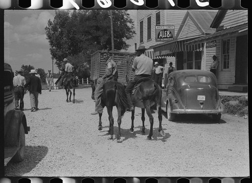 Untitled photo, possibly related to: Farmers trading mules and horses on "Jockey Street" in Campton, Kentucky