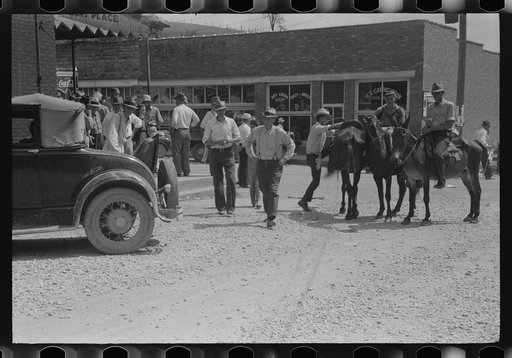 Untitled photo, possibly related to: Farmers trading mules and horses on "Jockey Street" in Campton, Kentucky