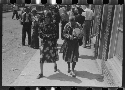 Untitled photo, possibly related to: Farmers trading mules and horses on "Jockey Street" in Campton, Kentucky