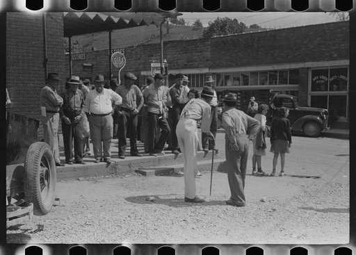 Untitled photo, possibly related to: Mountain people exchanging news and greetings on the street corner in center of town on Saurday afternoon and court day. Campton, Wolfe County, Kentucky