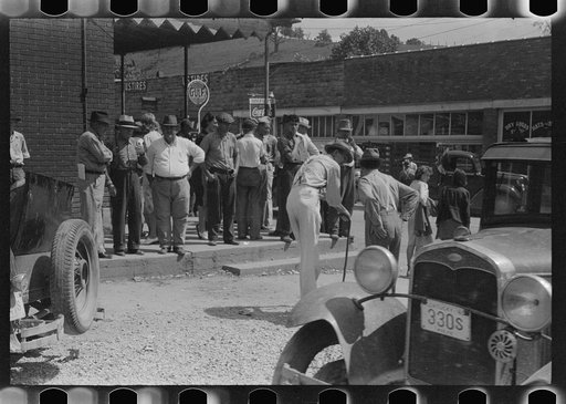 Untitled photo, possibly related to: Mountain people exchanging news and greetings on the street corner in center of town on Saurday afternoon and court day. Campton, Wolfe County, Kentucky