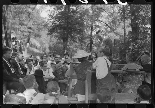 Untitled photo, possibly related to: Friends and relatives of the deceased listening to the preacher at an annual memorial meeting. Up Frozen Creek, near Jackson, Breathitt County, Kentucky. See general caption no. 1.