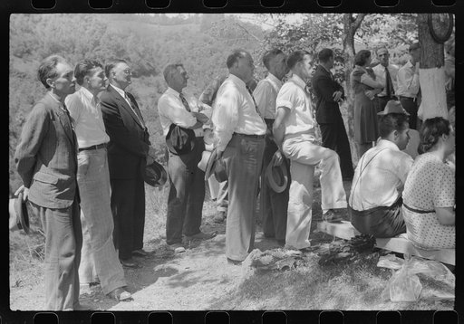 Friends and relatives of the deceased listening to the preacher at an annual memorial meeting. Up Frozen Creek, near Jackson, Breathitt County, Kentucky. See general caption no. 1.