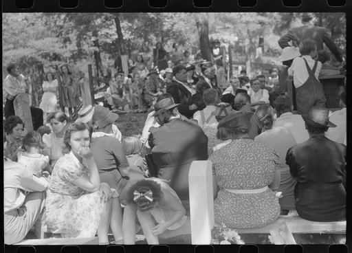 Untitled photo, possibly related to: Friends and relatives of the deceased listening to the preacher at an annual memorial meeting. Up Frozen Creek, near Jackson, Breathitt County, Kentucky. See general caption no. 1.