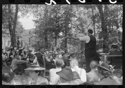 Preacher, relatives and friends of the deceased at a memorial meeting near Jackson, Breathitt County, Kentucky