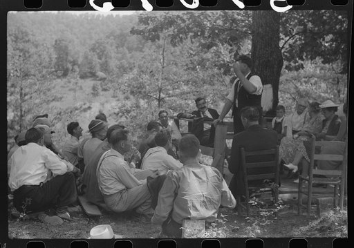 Preacher, relatives and friends of the deceased at an annual memorial meeting near Jackson, Breathitt County, Kentucky