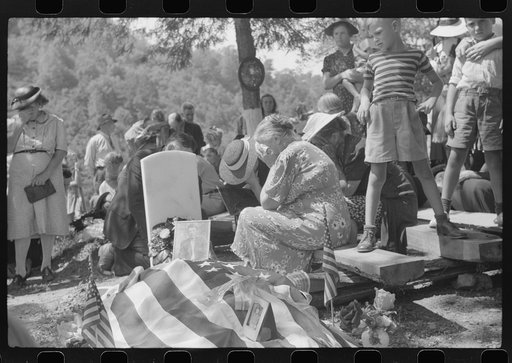 Untitled photo, possibly related to: Mother and widow and relatives weeping at the grave of deceased at memorial meeting near Jackson, Kentucky, Breathitt County. See general caption no. 1